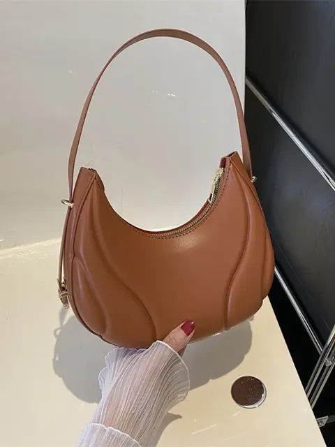 Streamline fashion handbag